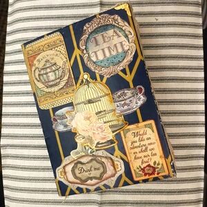 A vintage/antique English tea time themed junk journal